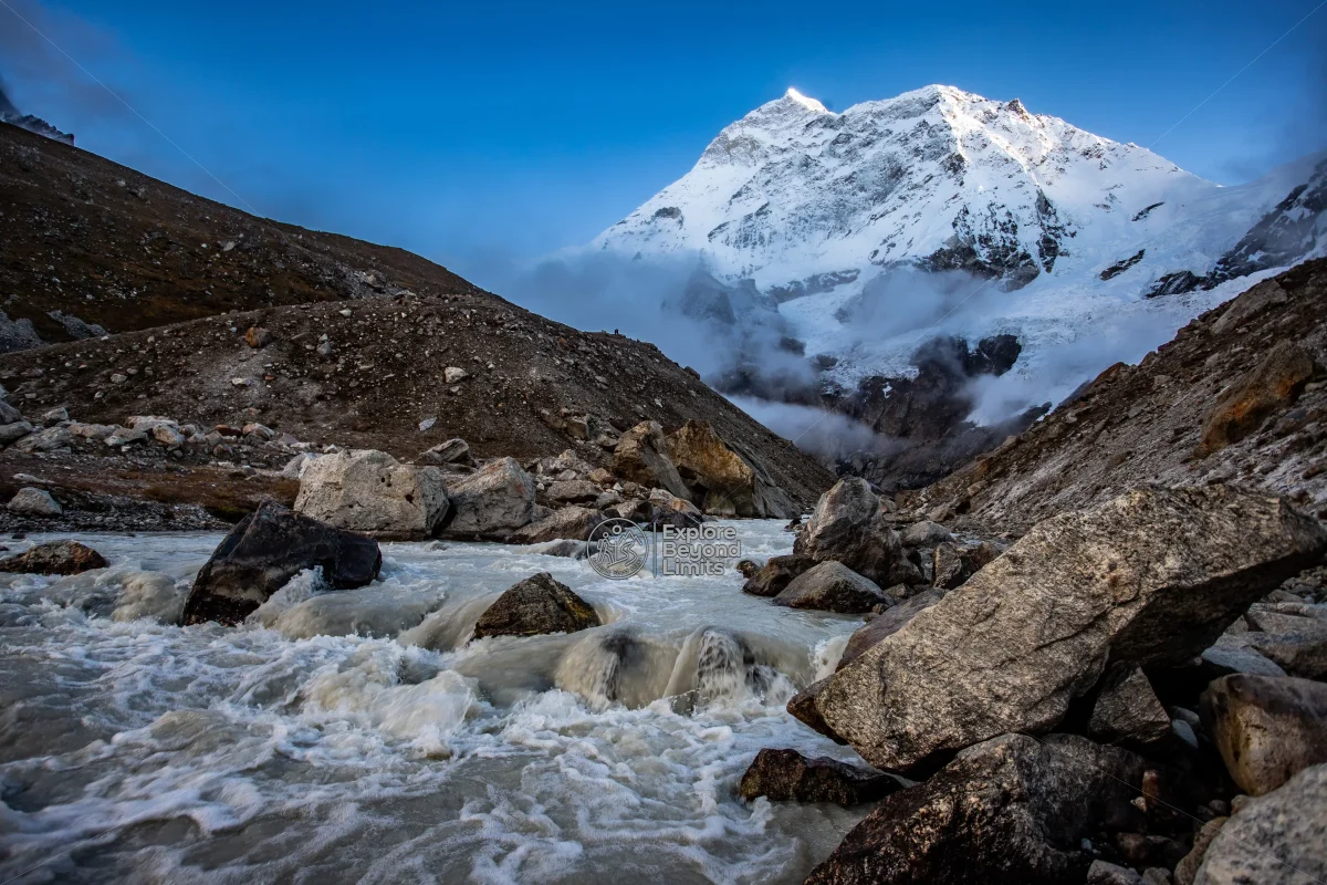 Makalu's pyramid-shaped summit rising above the Barun valley, seen from the approach to base camp
