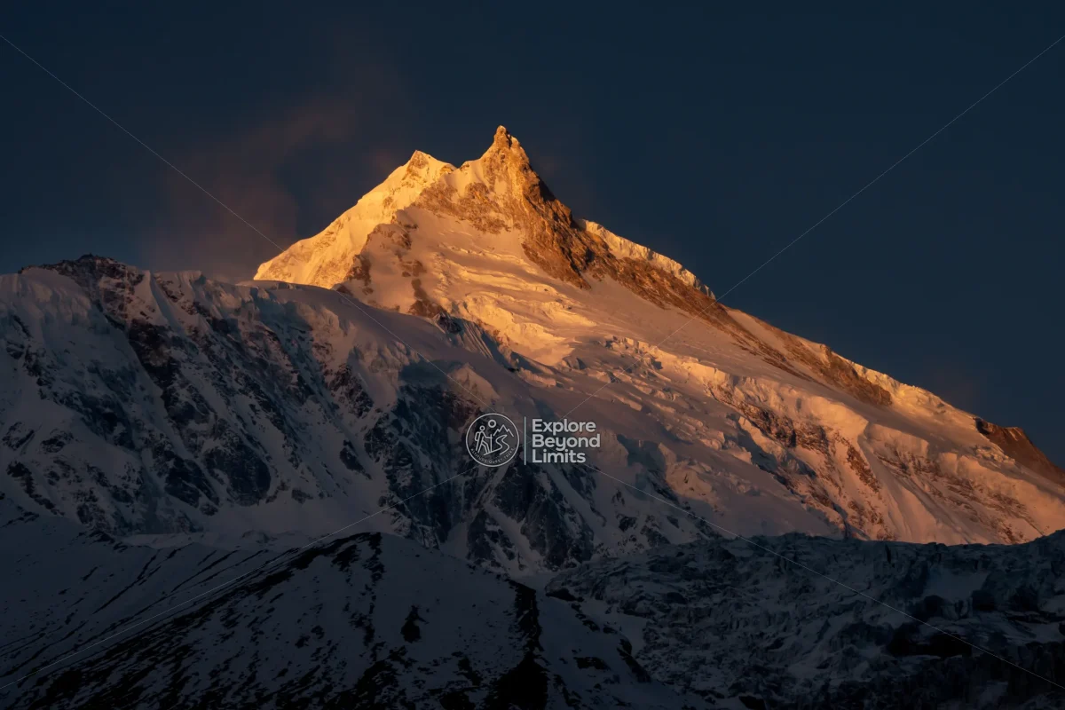 Mount Manaslu's summit above the Budhi Gandaki valley, seen from near Samagaun village